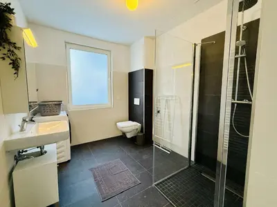 Ein Badezimmer in der Unterkunft MontiRooms- Apartment nahe Berlin & Natur