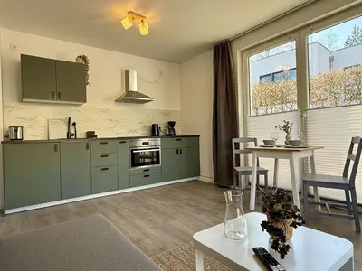 Küche/Küchenzeile in der Unterkunft MontiRooms- Apartment nahe Berlin & Natur