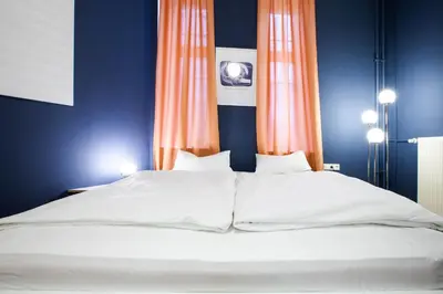 Ein Bett oder Betten in einem Zimmer der Unterkunft Studio Centrál
