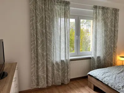 Ein Bett oder Betten in einem Zimmer der Unterkunft Geräumig, modern und perfekt angebunden!