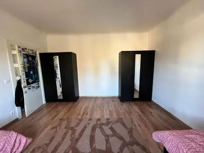 Ein Bett oder Betten in einem Zimmer der Unterkunft Geräumig, modern und perfekt angebunden!