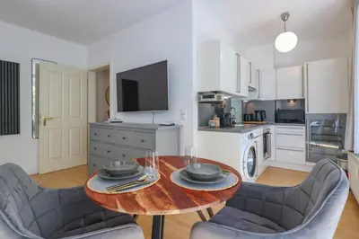 Küche/Küchenzeile in der Unterkunft WINS67 - Modernes Apartment mit großer Terrasse in Top Lage