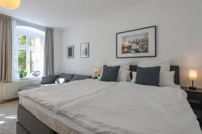 Ein Bett oder Betten in einem Zimmer der Unterkunft WINS67 - Modernes Apartment mit großer Terrasse in Top Lage