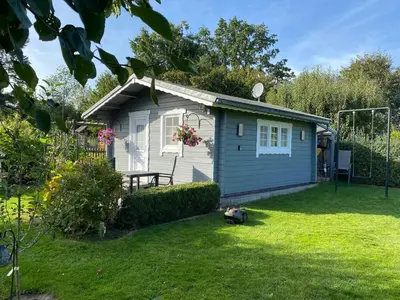 Ein Garten an der Unterkunft Ferienhäuschen in Beetz - in 5 min am See und Wald