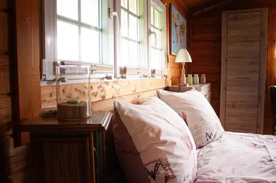 Ein Bett oder Betten in einem Zimmer der Unterkunft Ferienhäuschen in Beetz - in 5 min am See und Wald