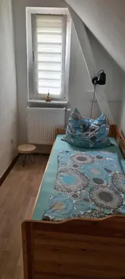 Ein Bett oder Betten in einem Zimmer der Unterkunft Ferienwohnung in Buckow Märkische Schweiz