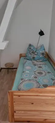 Ein Bett oder Betten in einem Zimmer der Unterkunft Ferienwohnung in Buckow Märkische Schweiz