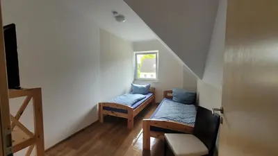 Ein Bett oder Betten in einem Zimmer der Unterkunft FeWo im Dahme-Seengebiet nahe Berlin