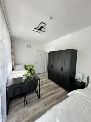 Ein Bett oder Betten in einem Zimmer der Unterkunft Damaschke Apartment 1 Kurfürstendamm