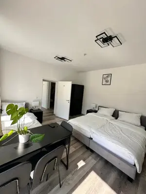 Ein Bett oder Betten in einem Zimmer der Unterkunft Damaschke Apartment 2 Kurfürstendamm