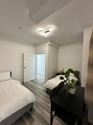 Ein Bett oder Betten in einem Zimmer der Unterkunft Damaschke Apartment 2 Kurfürstendamm