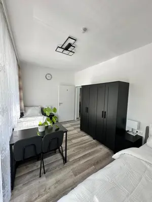 Ein Bett oder Betten in einem Zimmer der Unterkunft Damaschke Apartment 2 Kurfürstendamm