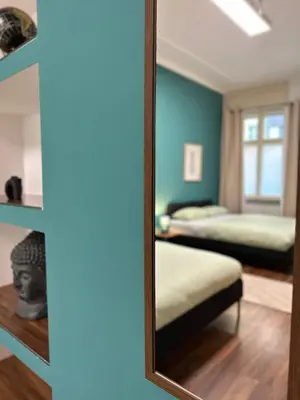 Ein Bett oder Betten in einem Zimmer der Unterkunft Stylish Wohnen in Prenzlauer Kiez nähe Mauerpark
