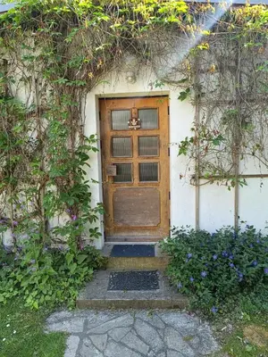 Eine Fassade oder ein Eingang zu Gartenhaus in Potsdam Wilhelmshorst