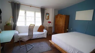 Ein Bett oder Betten in einem Zimmer der Unterkunft Gartenhaus in Potsdam Wilhelmshorst
