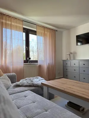 Ein Sitzbereich in der Unterkunft Ferienwohnung im Haus am See