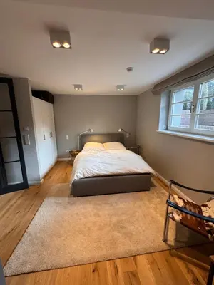 Ein Bett oder Betten in einem Zimmer der Unterkunft Neue 2 Zimmer Wohnung im Grünen mit Terrasse und Platz