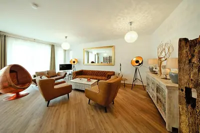 Ein Sitzbereich in der Unterkunft Appartement für 8 Personen in Strausberg