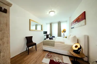 Ein Bett oder Betten in einem Zimmer der Unterkunft Appartement für 8 Personen in Strausberg