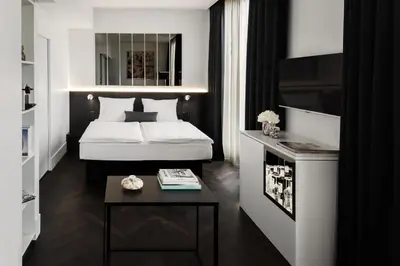 Ein Bett oder Betten in einem Zimmer der Unterkunft Hotel AMANO Grand Central