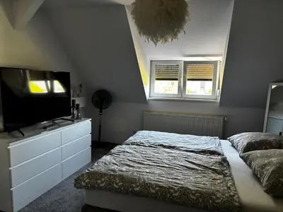 Ein Bett oder Betten in einem Zimmer der Unterkunft Ferienhaus am Friedenshain