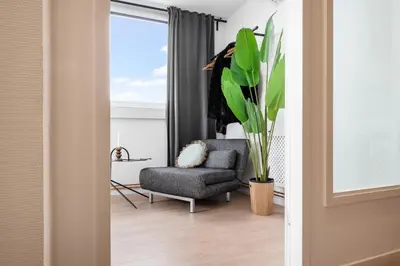 Ein Sitzbereich in der Unterkunft Urban Loft - 180 Skyline Balkon - 4SZ - HBF