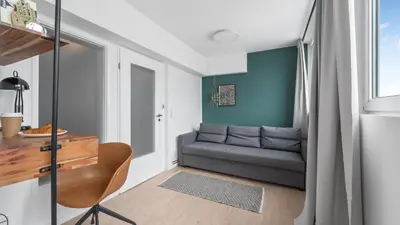 Ein Sitzbereich in der Unterkunft Urban Loft - 180 Skyline Balkon - 4SZ - HBF