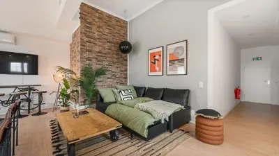 Ein Sitzbereich in der Unterkunft Urban Loft - 180 Skyline Balkon - 4SZ - HBF