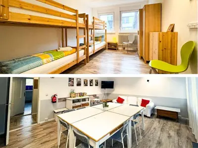 Ein Bett oder Betten in einem Zimmer der Unterkunft Ferienwohnungen Grabbeallee Three