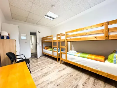 Ein Bett oder Betten in einem Zimmer der Unterkunft Ferienwohnungen Grabbeallee Three