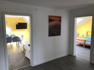 Ein Bett oder Betten in einem Zimmer der Unterkunft Ferienwohnungen Grabbeallee Two