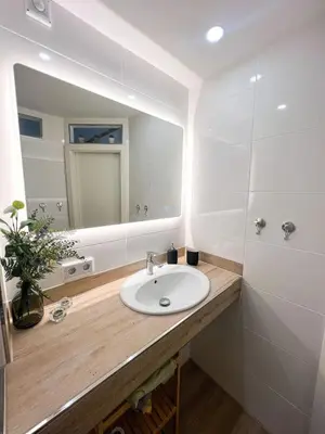 Ein Badezimmer in der Unterkunft Familystay am Botanischen Garten