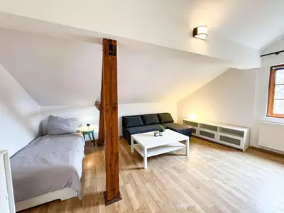 Ein Bett oder Betten in einem Zimmer der Unterkunft Large Apartment for Large Groups south of Berlin