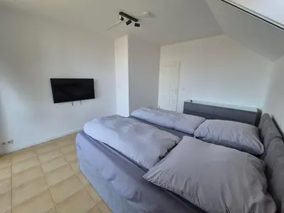 Ein Bett oder Betten in einem Zimmer der Unterkunft Monteurzimmer 2 Mit Seeblick
