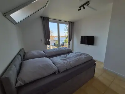 Ein Bett oder Betten in einem Zimmer der Unterkunft Monteurzimmer 2 Mit Seeblick