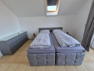 Ein Bett oder Betten in einem Zimmer der Unterkunft Monteurzimmer 2 Mit Seeblick