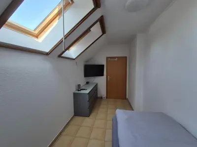TV/Unterhaltungsangebot in der Unterkunft Monteurzimmer 3 am See mit Garten