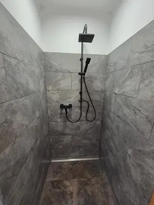 Ein Badezimmer in der Unterkunft Monteurzimmer 4 am See mit Garten