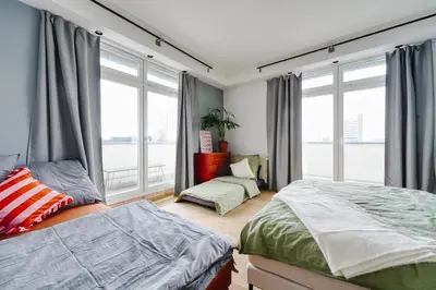 Ein Bett oder Betten in einem Zimmer der Unterkunft Urban Loft - 180 Skyline Balkon - 2 SZ - HBF