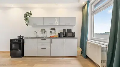 Küche/Küchenzeile in der Unterkunft Urban Loft - 180 Skyline Balkon - 2 SZ - HBF