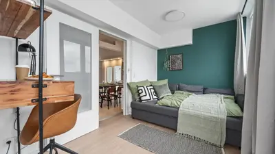 Ein Sitzbereich in der Unterkunft BIG Urban Loft - bis zu 20 Personen - 180qm - 180 Grad Skyline Balkon