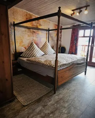 Ein Bett oder Betten in einem Zimmer der Unterkunft FeWo Italien