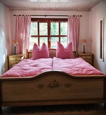 Ein Bett oder Betten in einem Zimmer der Unterkunft FeWo Alpenstube