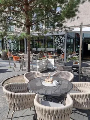 Ein Restaurant oder anderes Speiselokal in der Unterkunft Grimm's Potsdamer Platz