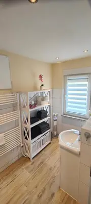 Ein Bett oder Betten in einem Zimmer der Unterkunft Ferienhaus Im Wäldchen in See Nähe