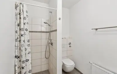 Ein Badezimmer in der Unterkunft Maritim 1