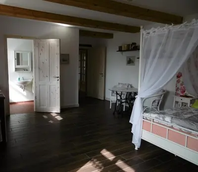 Ein Bett oder Betten in einem Zimmer der Unterkunft Oderbruchhütte
