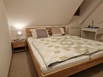 Ein Bett oder Betten in einem Zimmer der Unterkunft Gasthaus Fontane GmbH