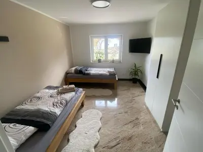 Ein Bett oder Betten in einem Zimmer der Unterkunft Luxus Ferienhaus Lina