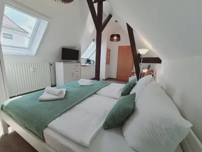 Ein Bett oder Betten in einem Zimmer der Unterkunft Neu! Spreelounge Apartments! Ihre Auszeit im Herzen des Spreewalds